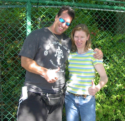 Chris Forbes and Janice L, Blake at Monmouth Park giving thumbs up